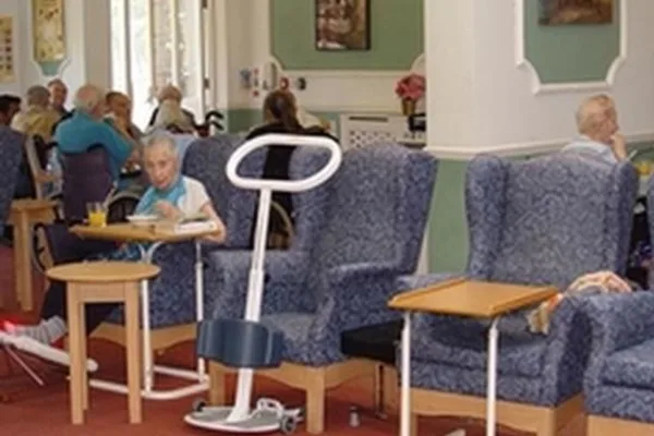 Residents relaxing in the lounge at Abbey Ravenscroft Park Nursing Home, Barnet